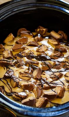 a crock pot filled with chocolate and marshmallows