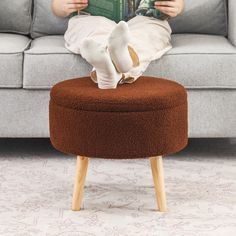 Constructed of soft fleece with solid wood legs, this ottoman comes with storage for your magazines, kids' toys, blankets and more. Ottoman With Tray, Storage Ottomans, Future Apartment, Foot Stool, Store Organization, Storage Ottoman, Storage And Organization, Wood Legs, Storage Furniture