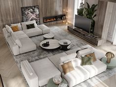 a modern living room with white couches and coffee table