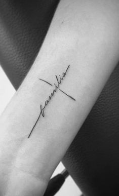 a small tattoo on the wrist that reads,'love you forever'in cursive script