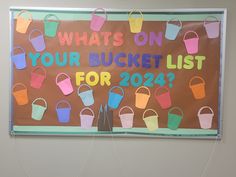 a bulletin board with buckets on it