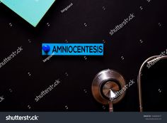 blue sticker with the word amocentess on it next to a faucet