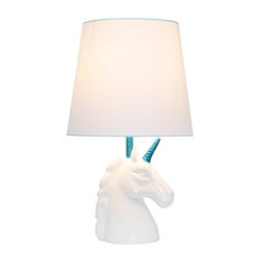 a white lamp with a blue base and a unicorn head on the bottom of it