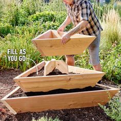 a man is working in the garden with his wooden boat