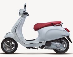 a white and red scooter is shown against a white background with no people