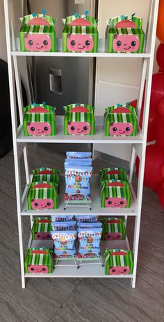 the shelves are filled with boxes for children's birthdays