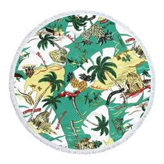 a round beach towel with palm trees on it