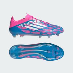 the soccer shoe is blue and pink