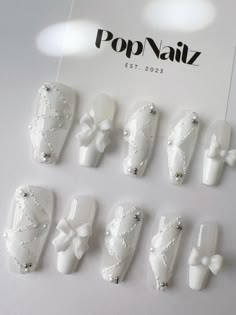 Welcome to PopNailz - your ultimate destination for handmade, fashion-forward press-on nails that combine elegance and convenience. We take pride in our meticulous craftsmanship, ensuring each set of nails is not only stunning but also durable, providing you with a long-lasting manicure. FEATURES: Handmade; Reusable; Variety of styles; Easy application; Cost effective; Pregnant safe. SIZE: XS/S/M/L MEASUREMENTS: Please measure your own nail and find your size from our picture guide. If you are b Nail Art Designs White Nails, Cute White Long Nails, Cute Nail Designs White, White Korean Nails, White Elegant Nails, White Nails With Charms, Nail Art Designs White, White Design Nails, Korean Press On Nails