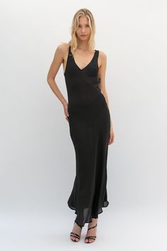 Sometimes loving comes easy, especially in the case of our Love Dress. This dress was made to make you look and feel your best. Featuring a sheer fabric and a bias cut, your body lines and curves will be perfectly accentuated whether worn lounging at home or out and about. Black - 100% Viscose Dry Clean only. Unlined and sheer. Saiai is 5'8 and Darina is 5'11 both wear a size 1 which is equivalent to a Small. This style is for PRE ORDER and will be shipping between July 16th - 17th. Please note Sheer V-neck Slip Dress, Fitted V-neck Maxi Dress For Loungewear, V-neck Viscose Dresses For Loungewear, Sleek V-neck Bias Cut Maxi Dress, Bias Cut Dress For Date Night, Chic Summer Slip Dress With Sheer Back, Sleeveless Slip Dress With Sheer Back, Sleek Maxi Slip Dress For Date Night, Sleek Maxi Length Slip Dress For Date Night