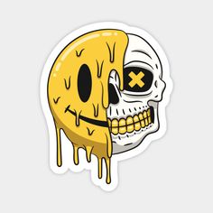 a yellow skull with eyes painted on it's face and the word x is dripping down