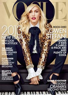 a woman sitting on top of a piano in front of a magazine cover with her legs crossed