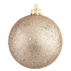 a gold christmas ornament hanging on a white background with golden glitters in the shape of a ball