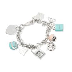 Tiffany & Co. Charm Bracelet In Sterling Silver Silver / Charms Tiffany &Amp; Co. Luxury Charm Bracelet With Logo, Elegant Silver Bracelet With Logo Charm, Luxury Silver Charm Bracelet, Designer Silver Bracelets With Logo Charm, Luxury Charm Bracelet With Logo Charm As Gift, Luxury Bracelets With Logo Charm As Gift, Luxury Logo Charm Bracelet As Gift, Modern Jewelry With Logo Charm For Gifts, Elegant Charm Bracelet With Logo Charm As Gift