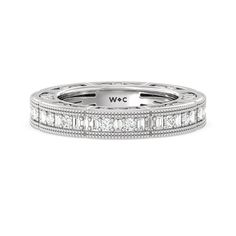 a white gold wedding band with princess cut diamonds