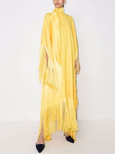 This yellow Taller Marmo Mrs. Ross fringed kaftan dress is made in Italy and designed for a loose fit. It features a wrap-around neck tie, wide sleeves, keyhole and button fastening to the nape, and full-length waterfall hemline. Tonal fringe detailing throughout completes this design. Silk Camisole Top, Striped Knitted Sweater, Black Runners, Paisley Fashion, Long Sleeve Denim Shirt, Tunic Designs, Wool Mini Skirt, Boucle Jacket