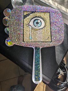 This is a gorgeous hand held fashion mirror that I create myself. I get the mirrors from a vendor and the decals from CA. I fix them to the color of mirror I choose and rhinestone them. Make Up Tools, Pocket Mirrors, Fashion Mirror, Rhinestone Fashion, Pocket Mirror, I Choose, Makeup Tools Brushes, Makeup Tools, Makeup Cosmetics