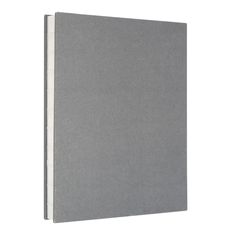 a gray book with white pages on the cover