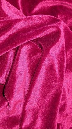 the fabric is shiny and bright pink