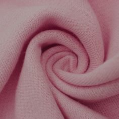 a close up view of a pink fabric