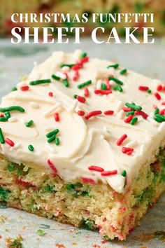 a piece of christmas funfetti sheet cake with white frosting and sprinkles