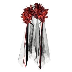 red flowers are in a vase with black ribbon around the neck and long ribbons at the bottom