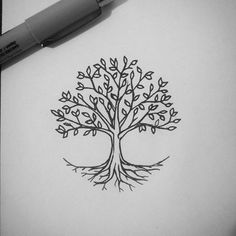 a drawing of a tree with its roots in the shape of a heart on paper