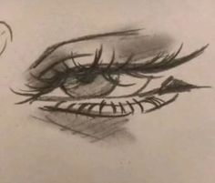 a drawing of a woman's eye with long lashes