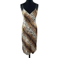 Cami Nyc Brown Leopard Print Silk V-Neck Slip Dress Size Small Chest: 17" Length: 44" Waist: 17" Hips: 22" New Without Tags Flaws ( If Any ) Will Be Photographed Above Please View All Photos! Returns: Please View All Photos As Well As The Written Description For Full Accuracy All Sales Are Final Item Descriptions : All Listing Photos Are Taken With An Ample Amount Of Light. If A Stock Photo Is Used It Is Just For Scale, Greater Detail Purposes. Item Condition : Most Items Listed Are Pre-Owned Pre-Owned Items Might Show Signs Of Wear (Piling, Imperfections, Flaws, Etc.) Which Will Be Mentioned In The Product Description And Shown In Photos. Thank You For Your Business ! Slip Dress Midi, Nyc Dresses, Cami Nyc, Womens Cami, Brown Leopard, Dress Midi, Small Chest, Silk Printing, Spaghetti Strap