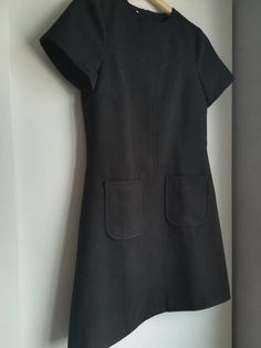 Made under request! Handmade dress in soft wool with lining 90%polyester 2%elastan 8%viscose Color: Black You can see here an example on a coat from the fabric https://www.etsy.com/listing/206734254/mod-wool-coat-60s-retro-soft-light-blue?ref=shop_home_active_1 You can choose your own measurements, length. Special request are easy, just add this listing to your cart https://www.etsy.com/listing/624364219/special-requests?ref=shop_home_active_25 If you want it on a rush you have priority shipping Retro A-line Mini Dress For Work, Classic Wool A-line Dress, A-line Mini Dress With Pockets For Work, Vintage Wool Dress For Workwear, Fitted Office Dresses With Pockets, Office Fitted Dress With Pockets, Fitted Knee-length Dress With French Seams, Knee-length Mini Dress For Winter Workwear, Winter Workwear Knee-length Mini Dress