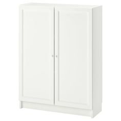 a white cabinet with two doors on the side