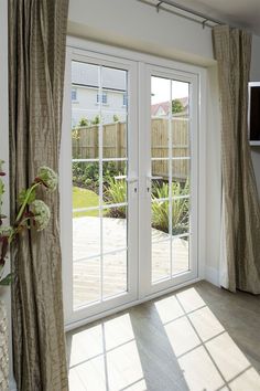 a living room with sliding glass doors leading outside