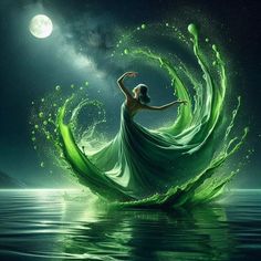 a woman in a green dress is floating on the water with her arms outstretched and head turned to the side