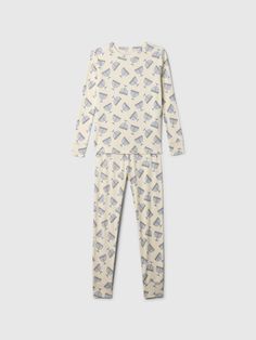 Soft organic cotton pajama set with a cozy brushed interior.  Crewneck.  Long sleeves.  Elasticized waist at PJ pants.  Assorted holiday-themed prints.  Made with 100% organically grown cotton, which is grown without the use of synthetic pesticides and fertilizers.  This product was made in a factory that runs the Gap Inc.  P. A. C. E.  Personal Advancement & Career Enhancement) program.  P. A. C. E.  is our educational program that helps the women who make our clothes build the skills, knowledg Cotton Pajama Sets, Top And Pants Set, Support People, Pj Pants, Gap Kids, Cotton Pyjamas, Pajama Top, Pesticides, Brushed Cotton