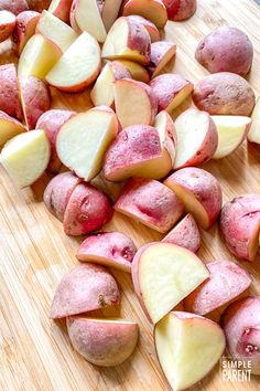 sliced up red potatoes on a cutting board