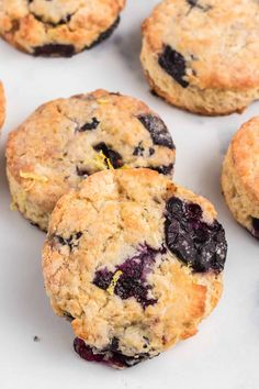 blueberry muffins on a baking sheet ready to be eaten