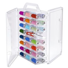 a clear storage case filled with lots of different colored spools