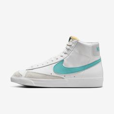 In the ‘70s, Nike was the new shoe on the block. So new in fact, we were still breaking into the basketball scene and testing prototypes on the feet of our local team. Of course, the design improved over the years, but the name stuck. The Nike Blazer Mid ’77 Vintage—classic since the beginning. Teal Nike Blazers, Teal Nikes, Blazer Mid 77 Vintage, Nike Blazer Mid 77, New Shoe, Nike Blazer Mid, Nike Blazers Mid, Blazer Mid, Nike Blazer