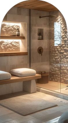 a bath room with two beds and a walk in shower