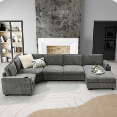 a living room with a sectional couch and ottoman