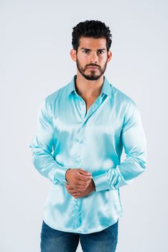 Measurements: Model is wearing size Medium. Fabric: Satin Fit: Relaxed fit About: This solid-colored satin dress shirt from Platini Jeans will enhance your fashionable wardrobe. The head-turning color adds flair to the classic long sleeve shirt. A relaxed fit delivers sleek style, and the point collar provides a modern finishing touch. Details & Features: Satin Point Collar Long sleeve Button closure Modern Fit Machine Washable Classic style Spring Long-sleeve Satin Dress With Satin Finish, Elegant Satin Shirt With Spread Collar, Formal Satin Finish Shirt, Semi-formal Satin Shirt For Spring, Fitted Satin Shirt With Spread Collar, Formal Blue Satin Shirt, Fitted Dress Shirt For Spring Party, Long Sleeve Satin Shirt With Satin Finish, Elegant Satin Shirt For Spring