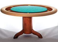 a wooden table with green felt on top