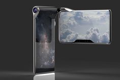 an open cell phone showing the sky and clouds