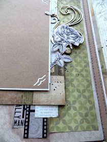 a scrapbook with some paper and scissors on it