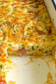 a casserole dish with ham and cheese