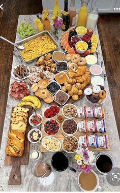 a table filled with lots of food and drinks