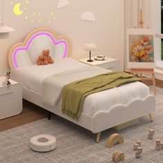 a child's bedroom with a bed, night stand and teddy bear on the floor