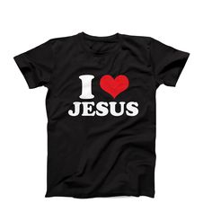 "I love Jesus T-Shirt, Christian Tee, I Heart Jesus T-Shirt, Faith-inspired Shirt, Christian Gift idea, Jesus Christ Tee, Love Jesus Tee Are you in search of a unique and personalized custom t-shirt? Well, your search ends here! We take immense pride in offering the widest range of I heart t-shirts available on the internet. But that's not all - if you don't find something that catches your eye, fret not! We would be absolutely delighted to customize a flawless I heart tee just for you. Simply c Black Slogan T-shirt For Valentine's Day, Valentine's Day Black Slogan T-shirt, Valentine's Day Black T-shirt With Text Print, Valentine's Day Black T-shirt With Slogan, Black Top With Funny Text For Valentine's Day, Funny Text Black Top For Valentine's Day, Valentine's Day Short Sleeve Slogan T-shirt, Valentine's Day Slogan T-shirt With Short Sleeves, Valentine's Day Slogan T-shirt Short Sleeve