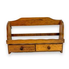 an old wooden bench with two drawers