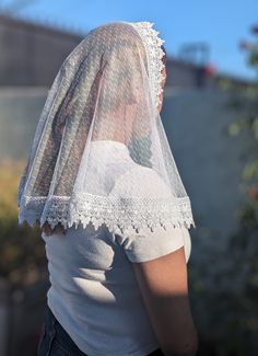 This is a D Shape Veil. This veil was made with a soft dot mesh lace fabric and is embellished with an offwhite trim around the edges.  It measures approx  38 x 19 inches The veil includes a sewn-in clip.  Veils are all handmade so no two pieces will be identical.  Please allow 3-7 business days for the order to be processed and shipped. Washing recommendations: Wash with cold or warm water by hand. Hand dry or tumble dry in low-medium heat. We recommend washing the veil before being used since the fabric was not prewashed before making the veil. If you have any questions about this veil don't hesitate to message me. Please keep in mind that the color may vary due to differences in computer/phone screens. I do accept returns the return window is 7 days therefore contact me as soon as possi White Lace With Lace Collar For Spring, White Lace With Contrast Detail For Summer, White Fitted Lace Veil, White Sheer Lace For Spring, Fitted White Lace Veil, Spring Sheer White Lace, White Lace Trim Tulle, Fitted Sheer White Veil, Fitted White Veil